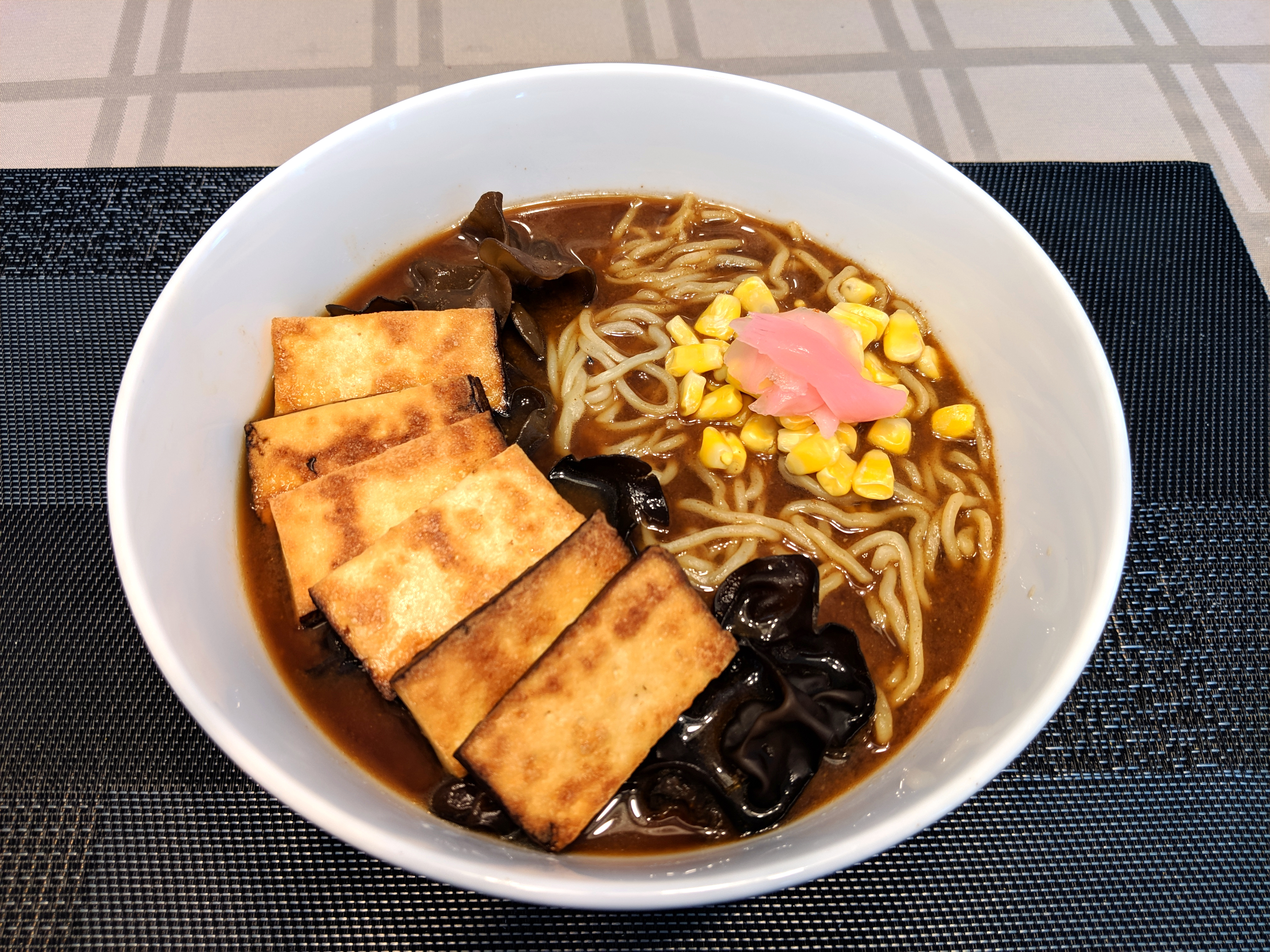 Ramen soup with five-spice tofu, corn, gari, and wood ears